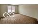 Bedroom with a window and neutral colored carpet at 4103 Railhead Ave, Westfield, IN 46074