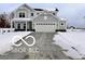 Two-story house with gray siding, white trim, and a three-car garage at 4103 Railhead Ave, Westfield, IN 46074