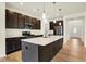 Kitchen featuring a large island, pendant lights, and stainless steel appliances at 4103 Railhead Ave, Westfield, IN 46074