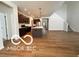 Open kitchen with island and dark cabinetry at 4103 Railhead Ave, Westfield, IN 46074
