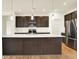 Kitchen with island, pendant lights, quartz counters, and stainless steel appliances at 4103 Railhead Ave, Westfield, IN 46074