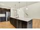 Kitchen featuring a large island, pendant lights, and stainless steel appliances at 4103 Railhead Ave, Westfield, IN 46074
