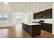 Kitchen featuring a large island, pendant lights, and stainless steel appliances at 4103 Railhead Ave, Westfield, IN 46074