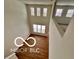 High ceiling living room with hardwood floors and large windows at 4103 Railhead Ave, Westfield, IN 46074