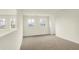 Cozy loft space with carpet, offering natural light from multiple windows with views of the neighborhood at 4103 Railhead Ave, Westfield, IN 46074