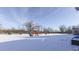 Spacious backyard with playset, covered in snow at 4223 Mardale Ln, Bargersville, IN 46106