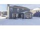 Gray house with sunroom and snowy backyard at 4223 Mardale Ln, Bargersville, IN 46106