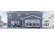 Gray house with sunroom and snowy backyard at 4223 Mardale Ln, Bargersville, IN 46106