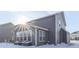 Gray house with sunroom and snowy backyard at 4223 Mardale Ln, Bargersville, IN 46106