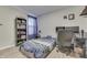 Bright bedroom with a bed, desk, and ample storage at 4223 Mardale Ln, Bargersville, IN 46106