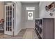 Bright entryway with coat closet, shoe storage, and decorative wreath at 4223 Mardale Ln, Bargersville, IN 46106