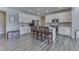 Modern kitchen with white cabinets, quartz countertops, and stainless steel appliances at 4223 Mardale Ln, Bargersville, IN 46106