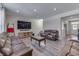 Open concept living room with hardwood floors and a view to the kitchen at 4223 Mardale Ln, Bargersville, IN 46106