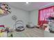 Fun playroom with toys, a small trampoline, and a bean bag chair at 4223 Mardale Ln, Bargersville, IN 46106