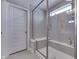 Spacious walk-in shower with built-in seat and glass enclosure at 4223 Mardale Ln, Bargersville, IN 46106