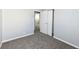 Spacious bedroom featuring grey carpet and ample closet space at 435 Belmar Ave, Indianapolis, IN 46219