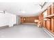 Empty garage with concrete floor and storage shelves at 435 Belmar Ave, Indianapolis, IN 46219