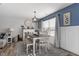 Dining room features a wooden table and bench seating at 4556 Plowman Dr, Indianapolis, IN 46237