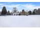 Winter view of house and snowy backyard at 457 S High School Rd, Indianapolis, IN 46241