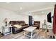 Relaxing basement rec room with leather furniture at 457 S High School Rd, Indianapolis, IN 46241