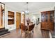 Dining room with drop leaf table and built-in shelving at 457 S High School Rd, Indianapolis, IN 46241