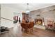 Dining room with drop leaf table and stone fireplace at 457 S High School Rd, Indianapolis, IN 46241