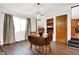 Dining room with drop leaf table and hardwood floors at 457 S High School Rd, Indianapolis, IN 46241