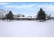 Ranch home exterior, snow covered yard at 457 S High School Rd, Indianapolis, IN 46241