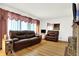 Living room with hardwood floors and comfortable seating at 457 S High School Rd, Indianapolis, IN 46241