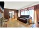 Living room with hardwood floors and comfortable seating at 457 S High School Rd, Indianapolis, IN 46241