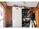 Storage room with shelving and upright freezer at 457 S High School Rd, Indianapolis, IN 46241