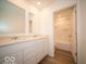 Bathroom with double sink vanity, modern fixtures, and a bathtub shower combo at 6039 Granby Dr, Whitestown, IN 46075