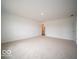 Spacious carpeted bedroom with neutral walls and an ensuite bathroom at 6039 Granby Dr, Whitestown, IN 46075