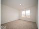 Bedroom with natural light, carpet, and a closet storage space at 6039 Granby Dr, Whitestown, IN 46075