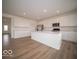 Bright open kitchen features stainless appliances, island and ample cabinet space at 6039 Granby Dr, Whitestown, IN 46075