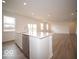 Modern open concept kitchen featuring island with stainless dishwasher at 6039 Granby Dr, Whitestown, IN 46075