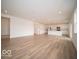 Open concept living room features bright lighting and stunning hard surface floors at 6039 Granby Dr, Whitestown, IN 46075