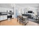 Eat-in kitchen with view into living room at 6041 Prairie Stream Way, Columbus, IN 47203