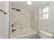 Updated bathroom with a modern bathtub, shower, and stylish tile at 6346 E County Road 100 S, Avon, IN 46123