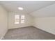 Bright bedroom featuring grey carpet and two large windows at 6346 E County Road 100 S, Avon, IN 46123