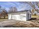 Detached single car garage with white exterior at 6346 E County Road 100 S, Avon, IN 46123