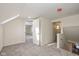 Upstairs hallway with carpet and access to bedrooms and bath at 6346 E County Road 100 S, Avon, IN 46123