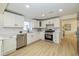 Newly renovated kitchen featuring white shaker cabinets and quartz countertops at 6346 E County Road 100 S, Avon, IN 46123