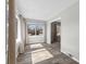 Sunlit dining area showcasing hardwood-style flooring and neutral tones at 6471 Homestead Dr, Indianapolis, IN 46227