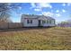 Quaint home with a fenced yard offering privacy and curb appeal at 6471 Homestead Dr, Indianapolis, IN 46227