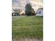 Well-manicured front yard adding curb appeal to this charming home with scenic views at 6471 Homestead Dr, Indianapolis, IN 46227