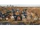 Aerial view of a neighborhood with various houses and cityscape in background at 730 Sanders St, Indianapolis, IN 46203
