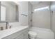 Clean bathroom with shower/tub combo and grey vanity at 730 Sanders St, Indianapolis, IN 46203