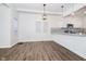 Bright dining area with hardwood floors and kitchen views at 730 Sanders St, Indianapolis, IN 46203