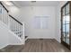 Entryway with hardwood floors and staircase at 730 Sanders St, Indianapolis, IN 46203